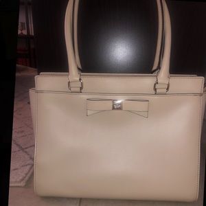 Kate Spade beige purse with bow
